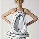 Illustration for article titled Gross Dress Makes Women Into Urinals